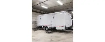 white restroom trailer