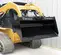 Black Paladin skit steer bucket attached to a skid steer