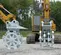 Gray Furukawa Compaction Wheel Attachment for Excavator