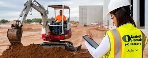 Jobsite excavator and tablet