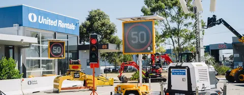 mobile signs and traffic lights and lights on ground 