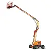 Beige and orange JLG articulating boom lift