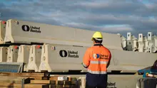 Banner concrete united rentals branded barriers and man with unitedbranded shirt