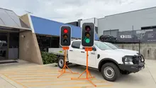 Trailer Mounted Traffic Lights - Tow trailer-mounted traffic light units packed in the equipment yard. 