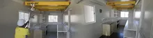Mobile shipping container converted into a functional room, showcasing portable and modular living or work space.